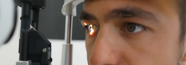 A man receiving an eye exam.